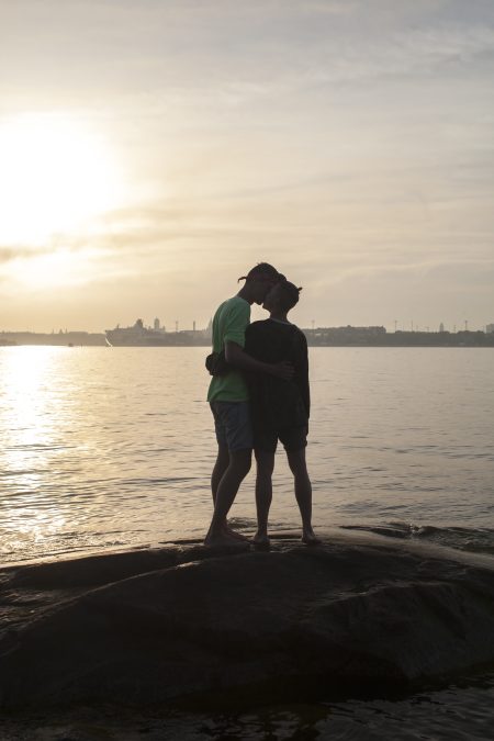 Couple embracing in the sunset